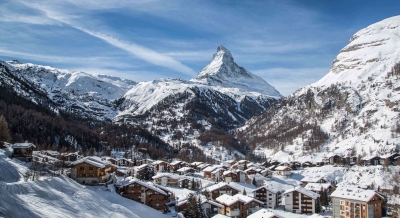 Switzerland in winter: big-mountain drama, velvet grooming, and fondue by the fire
